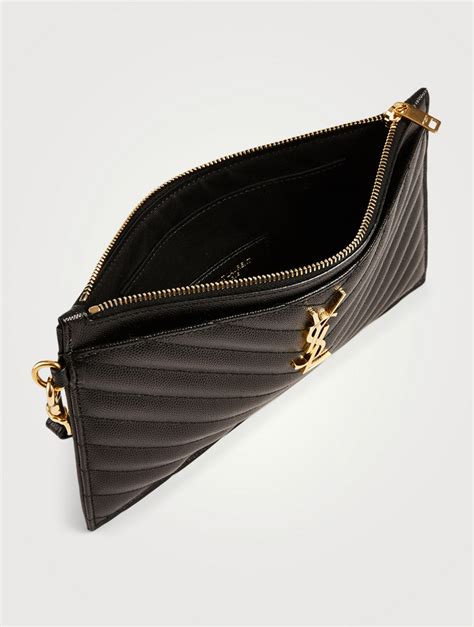 mytheresa ysl clutch|Large leather clutch in black .